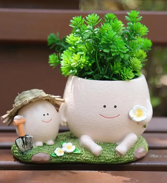 Plant Pot with Pot People Gardening Together